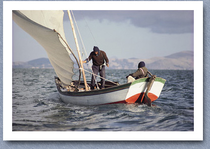 Two men fishing off Pariti