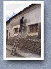 Man painting house, Tarabuco