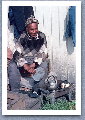 Fisherman making coffee, Angelmo