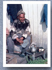 Fisherman making coffee, Angelmo