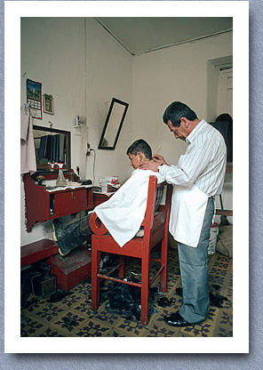 Getting a haircut, Urrao