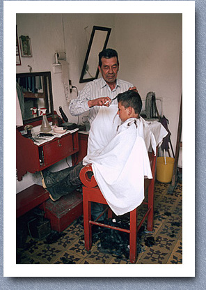 Getting a haircut, Urrao