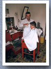 Getting a haircut, Urrao