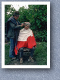 Old man having a haircut, Zalaron